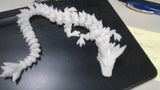 Articulated dragon 3d printed *Glows in Dark* (70 Tokens)